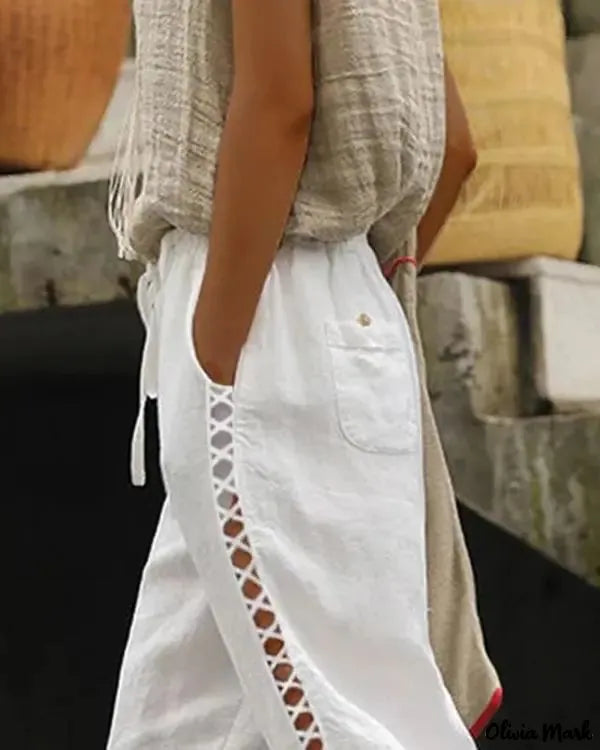 Pantalón Naomi con Elegantes Bolsillos y Detalles de Encaje