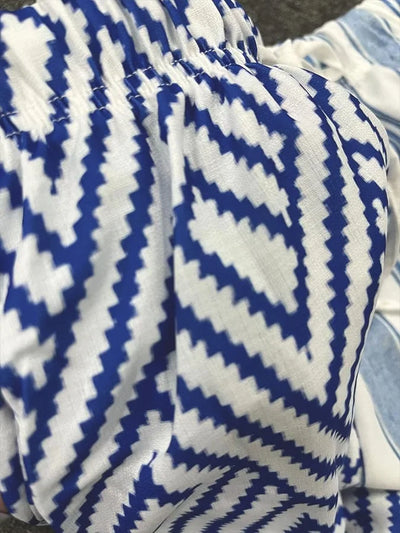 Lilian | Pantalón de rayas con botones decorativos