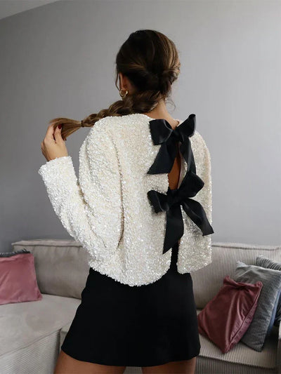 Aria | Elegante chaqueta de lentejuelas con lazo para un look sexy en invierno