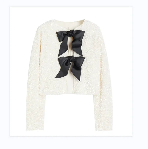Aria | Elegante chaqueta de lentejuelas con lazo para un look sexy en invierno