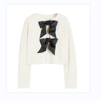 Aria | Elegante chaqueta de lentejuelas con lazo para un look sexy en invierno