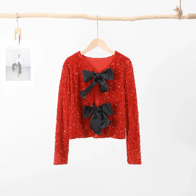 Aria | Elegante chaqueta de lentejuelas con lazo para un look sexy en invierno