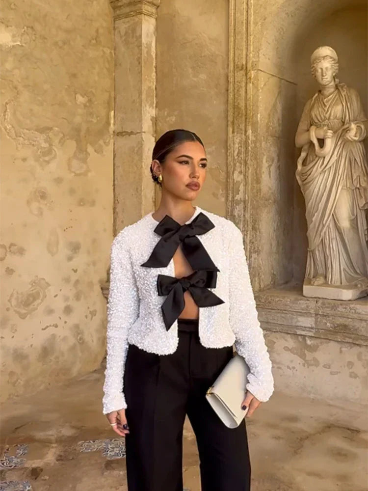 Aria | Elegante chaqueta de lentejuelas con lazo para un look sexy en invierno