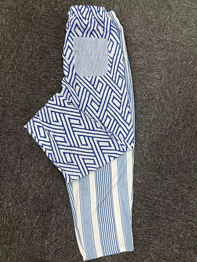 Lilian | Pantalón de rayas con botones decorativos